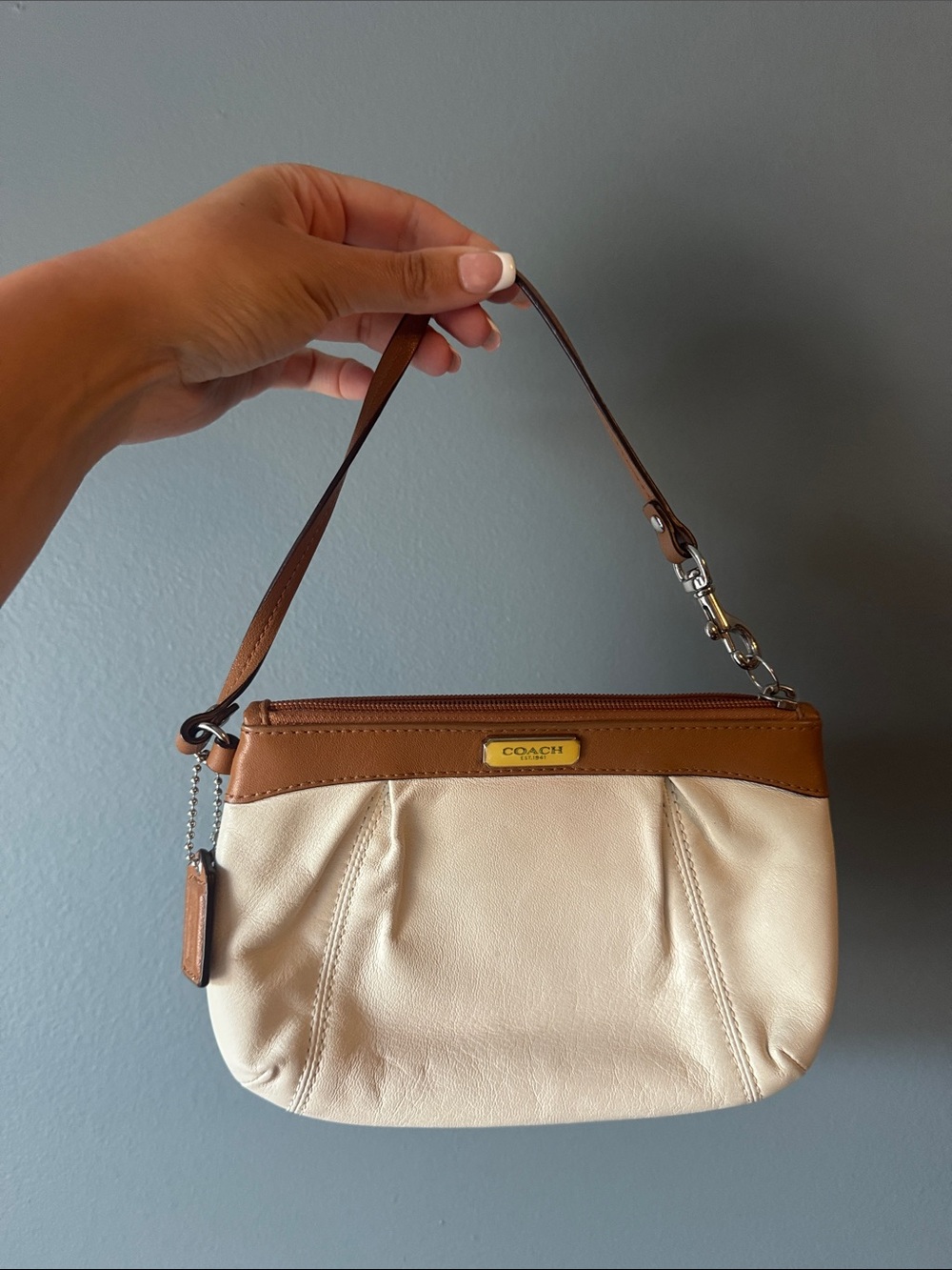 COACH Cream Leather Wristlet with Brown Trim